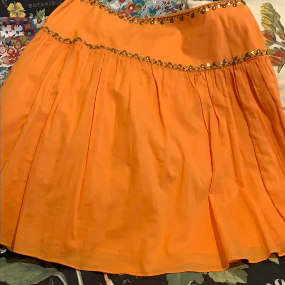Cute skirt, embellished with metallic beading.